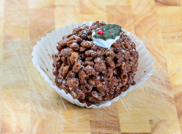A festive chocolate crispy cake on a wooden background